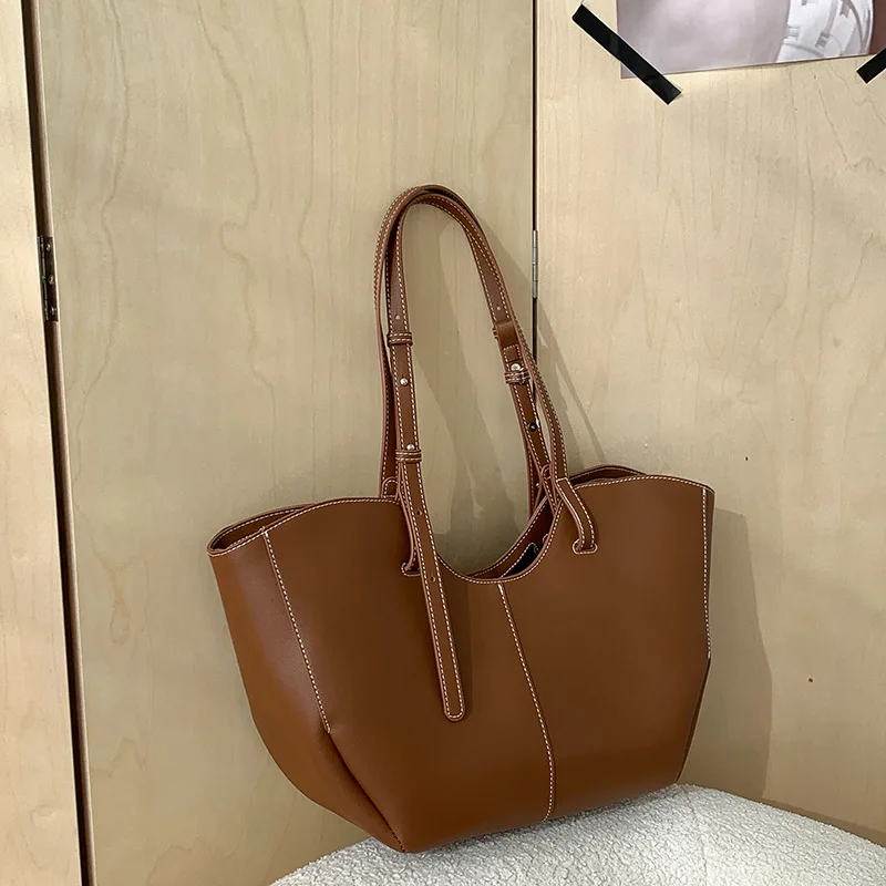 Luxury Bags Reseller - Sac à main vintage en cuir